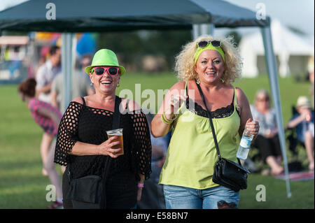 Two women enjoying themselves at the Brentwood Festival. Stock Photo