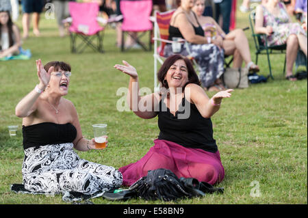 Two women enjoying themselves at the Brentwood Festival. Stock Photo