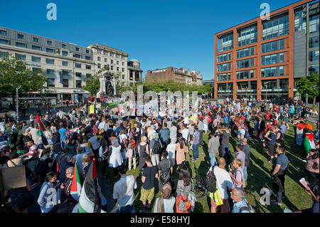 Manchester, UK. 23rd July, 2014. Hundreds of people attend a demonstration in the Piccadilly Gardens area of Manchester to protest over Israel's military actions in the Gaza Strip. Israel's actions have also been condemned by UN human rights official, Navi Pillay. Credit:  Russell Hart/Alamy Live News. Stock Photo