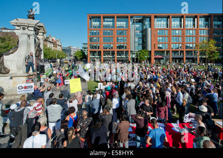 Manchester, UK. 23rd July, 2014. Hundreds of people attend a demonstration in the Piccadilly Gardens area of Manchester to protest over Israel's military actions in the Gaza Strip. Israel's actions have also been condemned by UN human rights official, Navi Pillay. Credit:  Russell Hart/Alamy Live News. Stock Photo