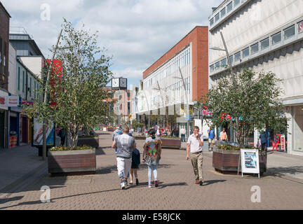 People walking through the pedestrianised High Street West, Sunderland, north east England, UK Stock Photo