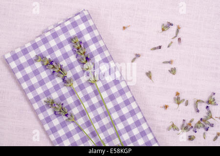 Violet checkered cloth with flowers of lavender Stock Photo
