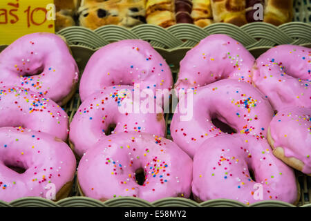 Glazed doughnuts, delicous desert in a nightmarket in Thailand. Ares a type of fried dough confectionery or dessert food. deep-f Stock Photo