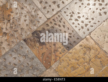 Marble flooring with distinctive pockmarking Stock Photo