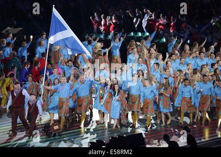 Celtic Park, Glasgow, Scotland, UK, Wednesday, 23rd July, 2014. Team Scotland flag bearer Euan Burton leading the Scottish athletes at the Glasgow 2014 Commonwealth Games Opening Ceremony Stock Photo