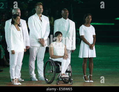 Glasgow, Scotland, UK. 23rd July, 2014. Flag bearers, Ian Thorpe of Australia (3rd L) stands on the stage during the opening ceremony of the XX Commonwealth Games at the Celtic Park in Glasgow, Britain, July 23, 2014. Credit:  Wang Lili/Xinhua/Alamy Live News Stock Photo
