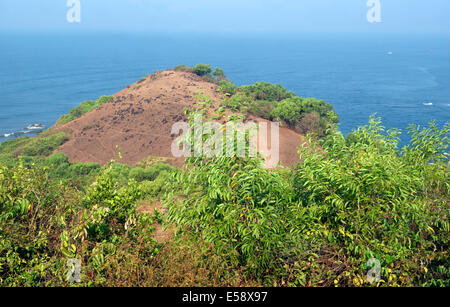 Goa Chapora fort bardez Goa Landscape of Cliff top view over Beach River Meeting Point Stock Photo