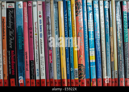 Books on the bookshelf in the café for background. Stock Photo