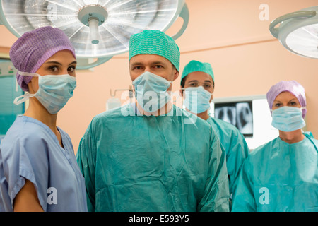 Medical professionals in an operating room Stock Photo