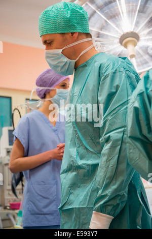 Medical team in an operating room Stock Photo