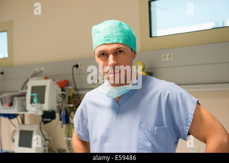 Portrait of a male surgeon in operating room