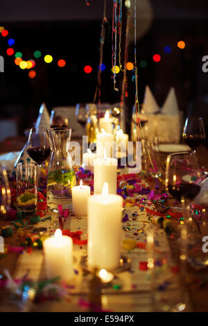 Lit candles on table at party