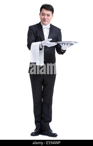 Happy waiter with serving tray Stock Photo