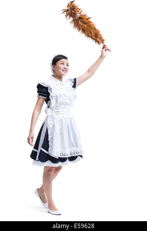 Happy maid cleaning Stock Photo