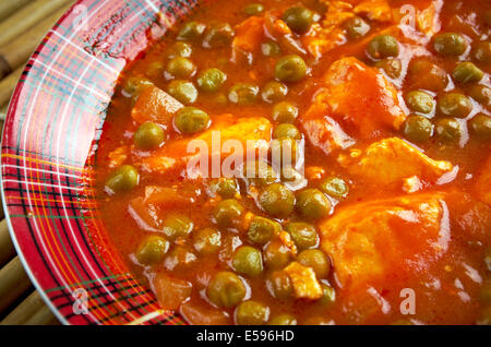 Mattar paneer -  is a vegetarian north Indian dish consisting of peas and farmer's cheese in a tomato based sauce,[1] spiced wit Stock Photo