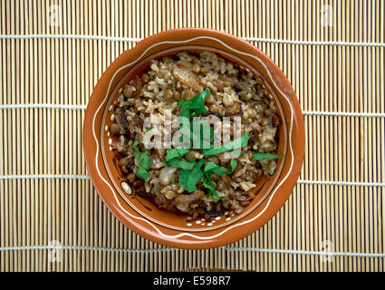 Mujaddara  is the Arabic lentils among the rice resemble pockmarks  saying in the Eastern Arab world Stock Photo