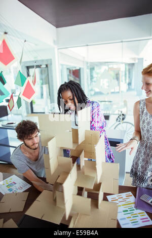 People building model in office Stock Photo