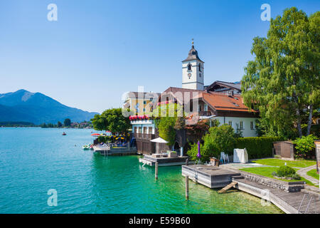 View of St. Wolfgang chapel and the village waterfront at Wolfgangsee lake, Austria Stock Photo