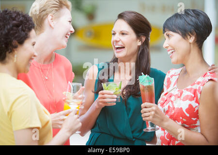 Women talking at party Stock Photo