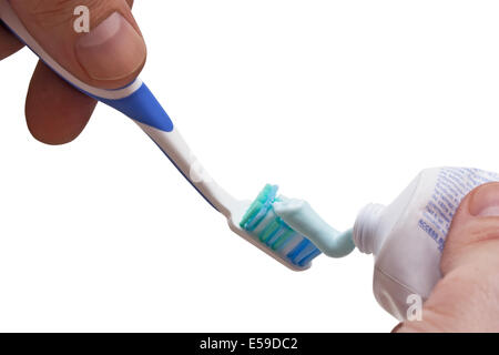 toothbrush with toothpaste squeezed out isolated  isolated on white background Stock Photo