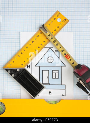 development drawings and tools on graph paper Stock Photo