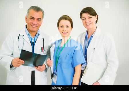 Portrait of confident doctors and nurse Stock Photo