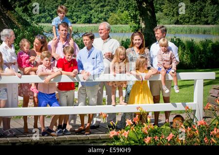 Grasten Palace, Denmark. 24th July, 2014. Members of the Danish Royal family, (L-R) Queen Margrethe, Princess Marie with Princess Athena, Prince Christian, Prince Joachim with Prince Henrik, Prince Felix, Prince Nikolei, Prince Henrik, Princess Josephine, Crown Princess Mary, Princess Isabella, Crown Prince Joachim and Prince Vincent attend a photo session for the press at Grasten Palace, Denmark, 24 July 2014. Photo: Patrick van Katwijk NETHERLANDS AND FRANCE OOUT - NO WIRE SERVICE -/dpa/Alamy Live News Stock Photo