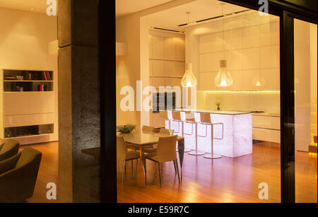 Kitchen and dining area in modern house Stock Photo