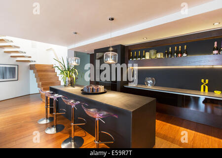 Bar stools and countertop in modern lounge Stock Photo