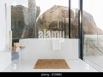 Bathtub and glass walls in modern bathroom Stock Photo