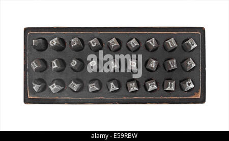 vintage metal lettering stamps punch set in a wooden box, clipping path Stock Photo