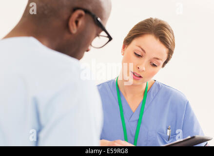 Nurse talking with patient Stock Photo