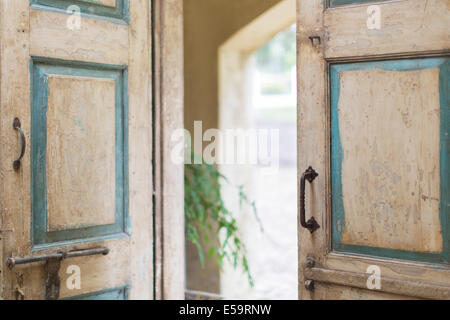 Close up of door and handles of rustic house Stock Photo