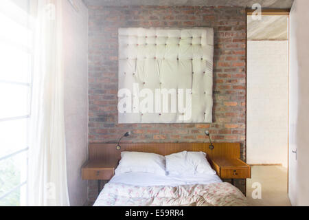 Wall hanging in modern bedroom Stock Photo