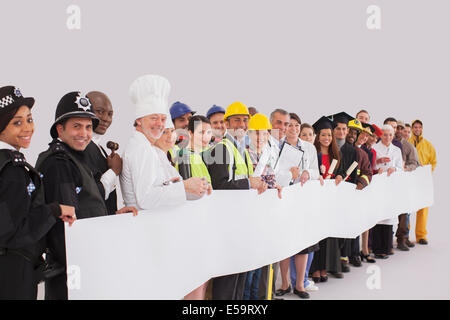 Portrait of diverse workforce with blank signs Stock Photo