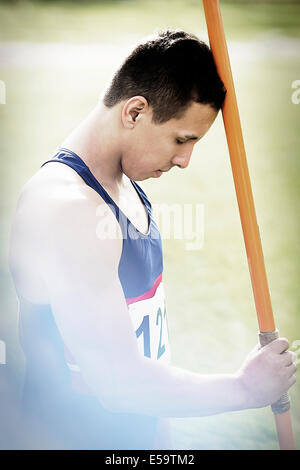 Track and field athlete holding javelin Stock Photo