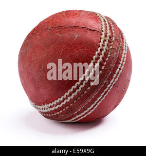 Old worn out red leather cricket ball Stock Photo