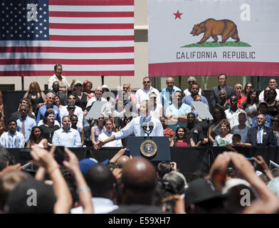 Los Angeles, California, USA. 24th July, 2014. US President Barack Obama arrived at the Los Angeles Trade Technical College just south of the downtown on Thursday afternoon just after noontime. A little after 1 p.m. Obama came out to address several hundred students and supporters and speaking for about 45 minutes. Obama came down to the crowd to shake hands and speak one on one to several people before leaving to go back to his hotel, LAX and a flight back to Washington DC. Credit:  David Bro/ZUMA Wire/Alamy Live News Stock Photo