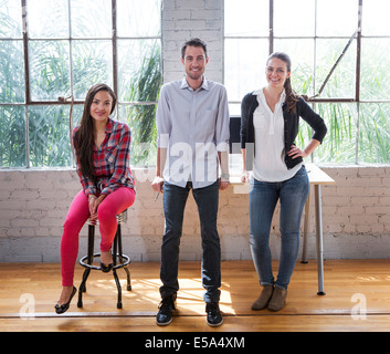 Architects smiling in office Stock Photo