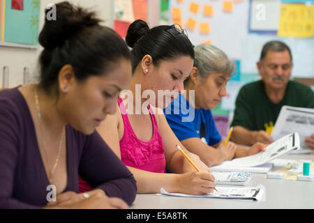 Adult students in free English as a Second Language (ESL) class for non-native English speakers in Austin TX. Stock Photo