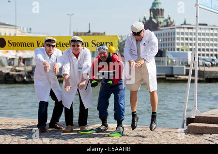 Finland's Unscientific Society throws a Cold Stone at Helsinki’s South Harbour in Finland Stock Photo