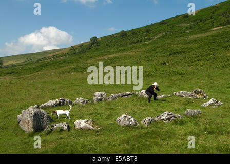 Yockenthwaite Stone Circle Langstrothdale valley in the Yorkshire Dales National Park. Woman taking photograph England UK 2010s 2014 HOMER SYKES Stock Photo