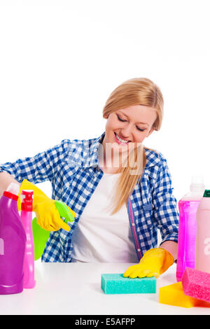 Cheerful woman cleaning the table, Debica, Poland Stock Photo