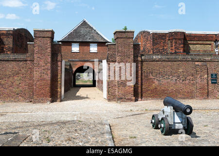 Cannon on the parade ground in front of the Landport gate at Tilbury Fort, Essex, England, UK. Stock Photo