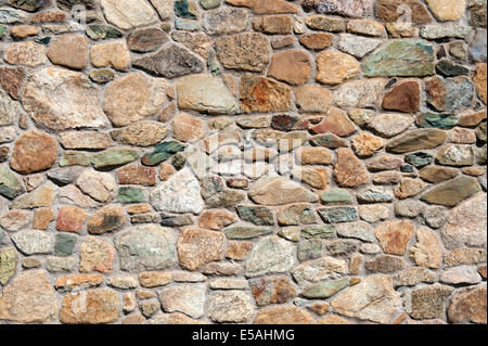 Closeup of a field stone wall. Stock Photo
