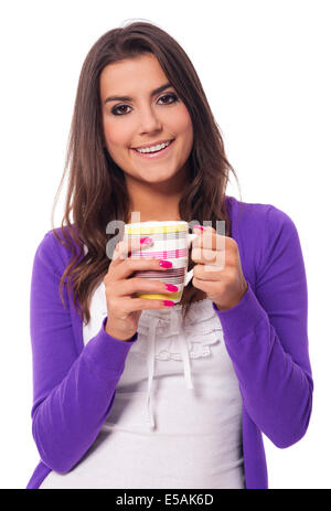 Happy woman holding cup of coffee, Debica, Poland Stock Photo