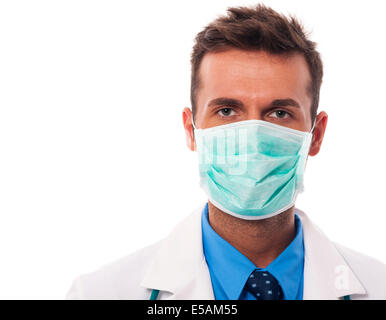 Portrait of male doctor wearing surgical mask, Debica, Poland Stock Photo