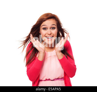 Young surprised woman with hand next to her face, Debica, Poland Stock Photo