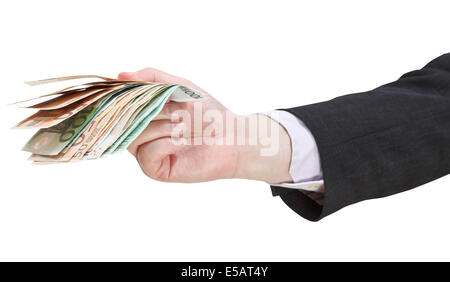 many euro banknotes in businessman hand isolated on white background Stock Photo