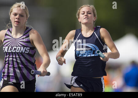 Des Moines, Iowa, USA. 23rd May, 2014. Northeast's Hannah Kilburg, crosses the finish line good for 8th place overall in the 2A Girls 4X200 at the Iowa State Track Championships at Drake University in Des Moines, IA., Friday, May, 23rd, 2014. © Louis Brems/Quad-City Times/ZUMA Wire/Alamy Live News Stock Photo